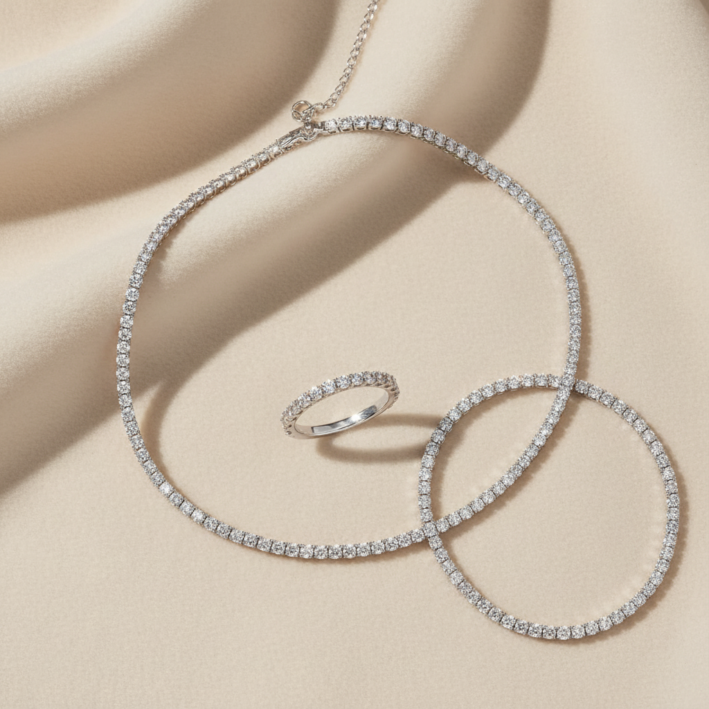 Set anello, collana e bracciale Tennis Elegance flat lay