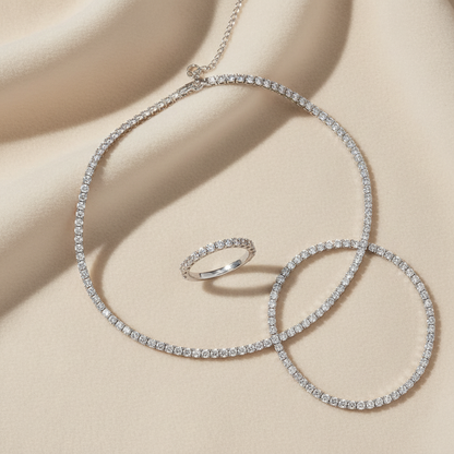 Set anello, collana e bracciale Tennis Elegance flat lay